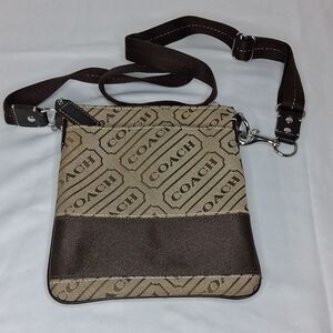 SMALL MONOGRAM CROSSBODY SWING PACK FTL-05-053